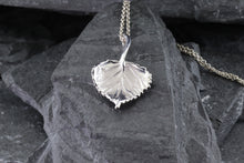 Load image into Gallery viewer, Cherish the elegance of nature with our exquisite 14K White Gold Aspen Leaf Pendant, intricately crafted to embody the grace of the Aspen tree. A perfect gift for someone special or a unique treat for yourself, this stunning piece represents growth, renewal, and resilience. The pendant comes with a matching 16" 14K White Gold Chain, beautifully complementing the pendant's design. Features: Custom 14K White Gold Aspen Leaf Pendant 16" 14K White Gold Chain View #1
