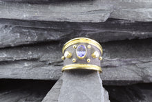 Load image into Gallery viewer, Handmade 18kt Satin Finish Antiqued And Polished Ring With One Oval Tanzanite And Two Round Diamonds, View #1