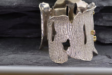 Load image into Gallery viewer, Handmade Sterling Silver Cuff Bracelet With Round Sapphires/Tsavorite Stones set in 18K Yellow Gold Bezels, View #4