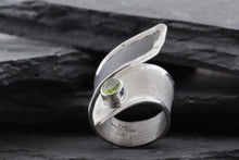 Load image into Gallery viewer, Two Tone White & Blackened Sterling Silver Satin & Polished Contemporary Ring Bezel Set With One Oval Peridot, View #4