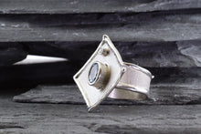 Load image into Gallery viewer, White Sterling Silver Satin & Polished Contemporary Ring With One Oval Aqua and One Round Diamond., View #4