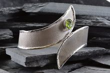 Load image into Gallery viewer, Two Tone Sterling Silver Satin & Polished Contemporary Cuff Bracelet With One Oval Peridot And One Round Diamond, View #3