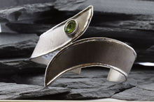 Load image into Gallery viewer, Two Tone Sterling Silver Satin & Polished Contemporary Cuff Bracelet With One Oval Peridot And One Round Diamond, View #1