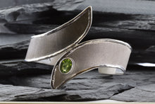Load image into Gallery viewer, Two Tone Sterling Silver Satin & Polished Contemporary Cuff Bracelet With One Oval Peridot And One Round Diamond, View #2