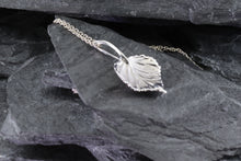 Load image into Gallery viewer,  Cherish the elegance of nature with our exquisite 14K White Gold Aspen Leaf Pendant, intricately crafted to embody the grace of the Aspen tree. A perfect gift for someone special or a unique treat for yourself, this stunning piece represents growth, renewal, and resilience. The pendant comes with a matching 16&quot; 14K White Gold Chain, beautifully complementing the pendant&#39;s design.  Features:  Custom 14K White Gold Aspen Leaf Pendant 16&quot; 14K White Gold Chain, View #4
