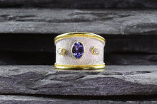 Load image into Gallery viewer, Lady&#39;s Two Tone 18 Karat Satin &amp; Polished Contemporary Fashion Ring With 1 Oval Tanzanite And 2 Round Diamonds View #4
