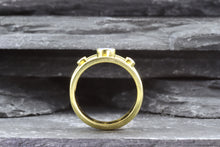 Load image into Gallery viewer, Lady&#39;s Two Tone 18 Karat Satin &amp; Polished Contemporary Fashion Ring With 1 Oval Tanzanite And 2 Round Diamonds View #7
