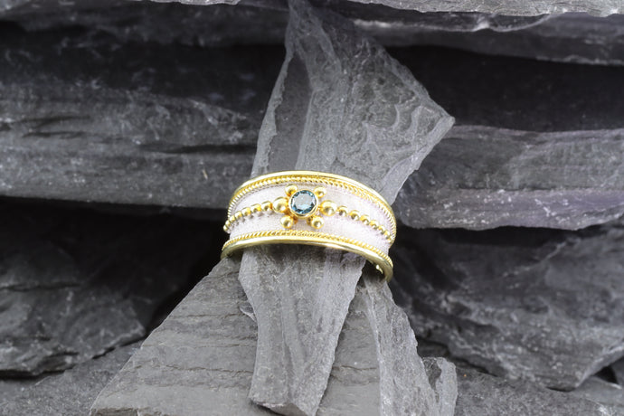 Lady's Two Tone 18 Karat Satin & Polished Contemporary Fashion Ring With One Blue Round Diamond, View #1