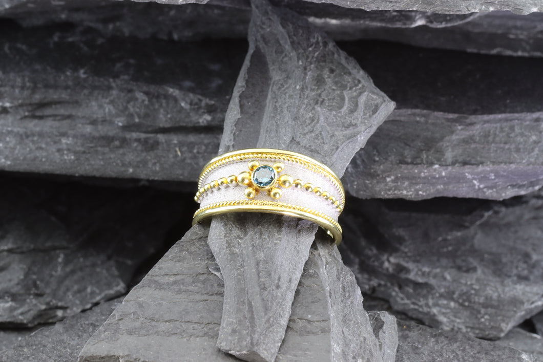 Lady's Two Tone 18 Karat Satin & Polished Contemporary Fashion Ring With One Blue Round Diamond, View #1