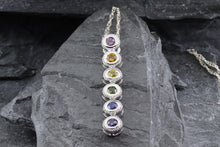Load image into Gallery viewer, Sterling Silver Drop Pendant set with Sapphires 1 Red, 1 Orange, 1 Yellow, 1 Green, 1 Blue and 1 Purple
