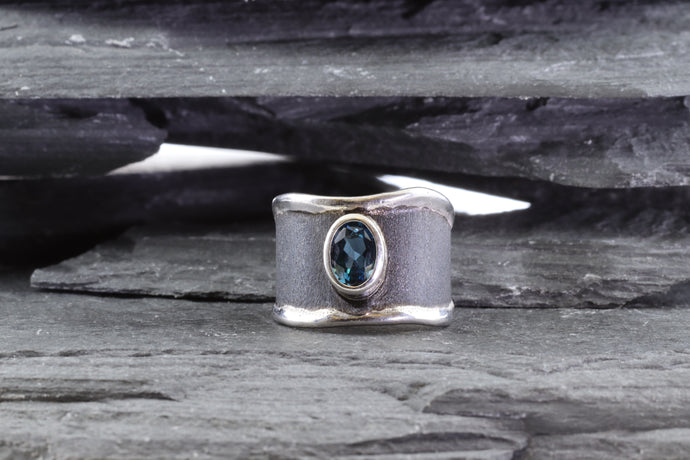 Sterling Silver & Satin Polished Oxidized Contemporary Ring With One Oval Blue Topaz., View #1