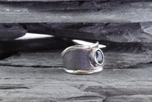 Load image into Gallery viewer, Sterling Silver &amp; Satin Polished Oxidized Contemporary Ring With One Oval Blue Topaz., View #3
