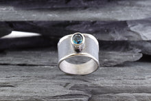 Load image into Gallery viewer, Sterling Silver &amp; Satin Polished Oxidized Contemporary Ring With One Oval Blue Topaz., View #4
