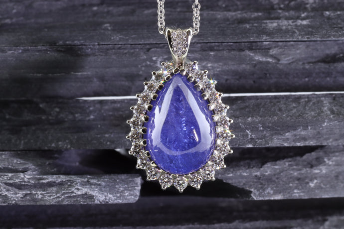 White 18 Karat Necklace Length 18, One Cabochon Tanzanite, 23 Round Diamonds, 13 Round Diamonds, View #1