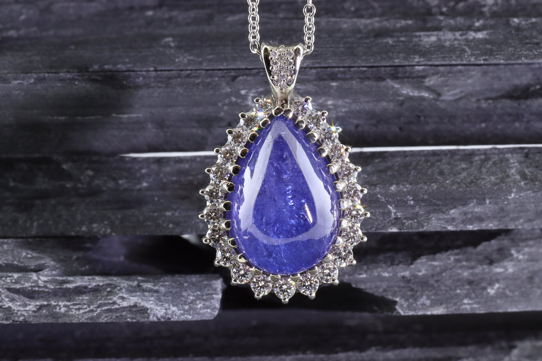 White 18 Karat Necklace Length 18, One Cabochon Tanzanite, 23 Round Diamonds, 13 Round Diamonds, View #1