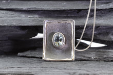 Load image into Gallery viewer, White Sterling Silver Satin &amp; Oxidized Bezel Set Pendant With One Oval Aquamarine, View #1
