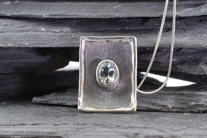 White Sterling Silver Satin & Oxidized Bezel Set Pendant With One Oval Aquamarine, View #1