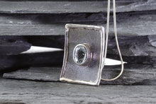 Load image into Gallery viewer, White Sterling Silver Satin &amp; Oxidized Bezel Set Pendant With One Oval Aquamarine, View #2
