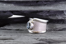 Load image into Gallery viewer, White Sterling Silver Satin &amp; Polished Contemporary Ring Bezel Set With One Oval Blue Topaz
