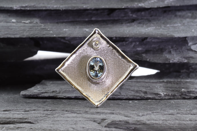 White Sterling Silver Satin & Polished Contemporary Ring With One Oval Aqua and One Round Diamond., View #1