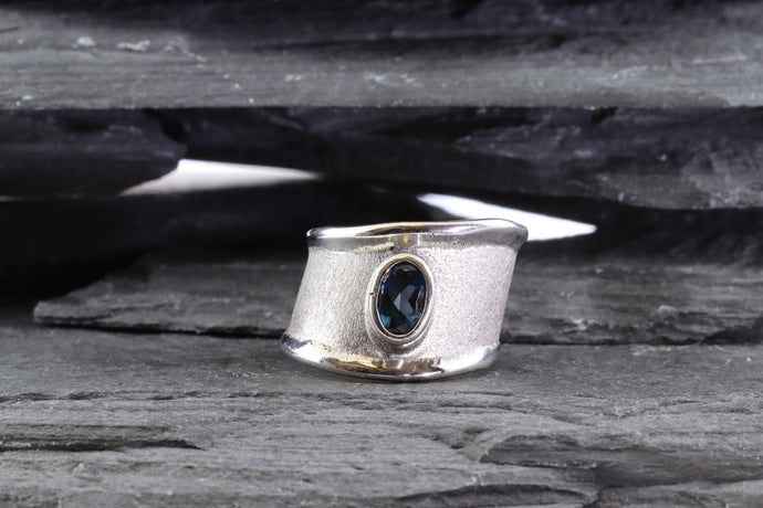 White Sterling Silver Satin & Polished Contemporary Ring With One Oval Blue Topaz., View #1