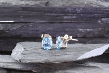 Load image into Gallery viewer, White Sterling Silver Stud Earrings With Two Trillion Blue Topaz, View #2
