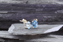 Load image into Gallery viewer, White Sterling Silver Stud Earrings With Two Trillion Blue Topaz, View #3
