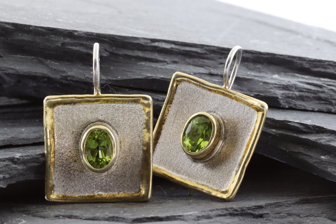 Two Tone Sterling Silver Satin & Polished Contemporary Earrings With Oval Peridots, View #1.